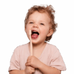 a child with a tooth brush